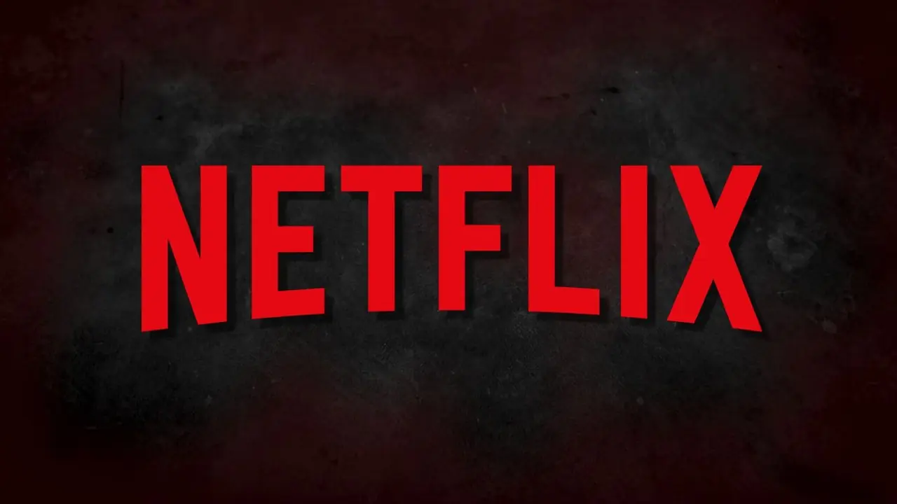 Logo Netflix znajduje się na brudnym czarnym i ciemnoczerwonym tle