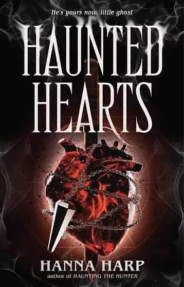 يُظهر غلاف Haunted Hearts بقلم Hanna Hap قلبًا ملفوفًا بسلسلة يُظهر غلاف Haunted Hearts بقلم Hanna Hap قلبًا ملفوفًا بسلسلة