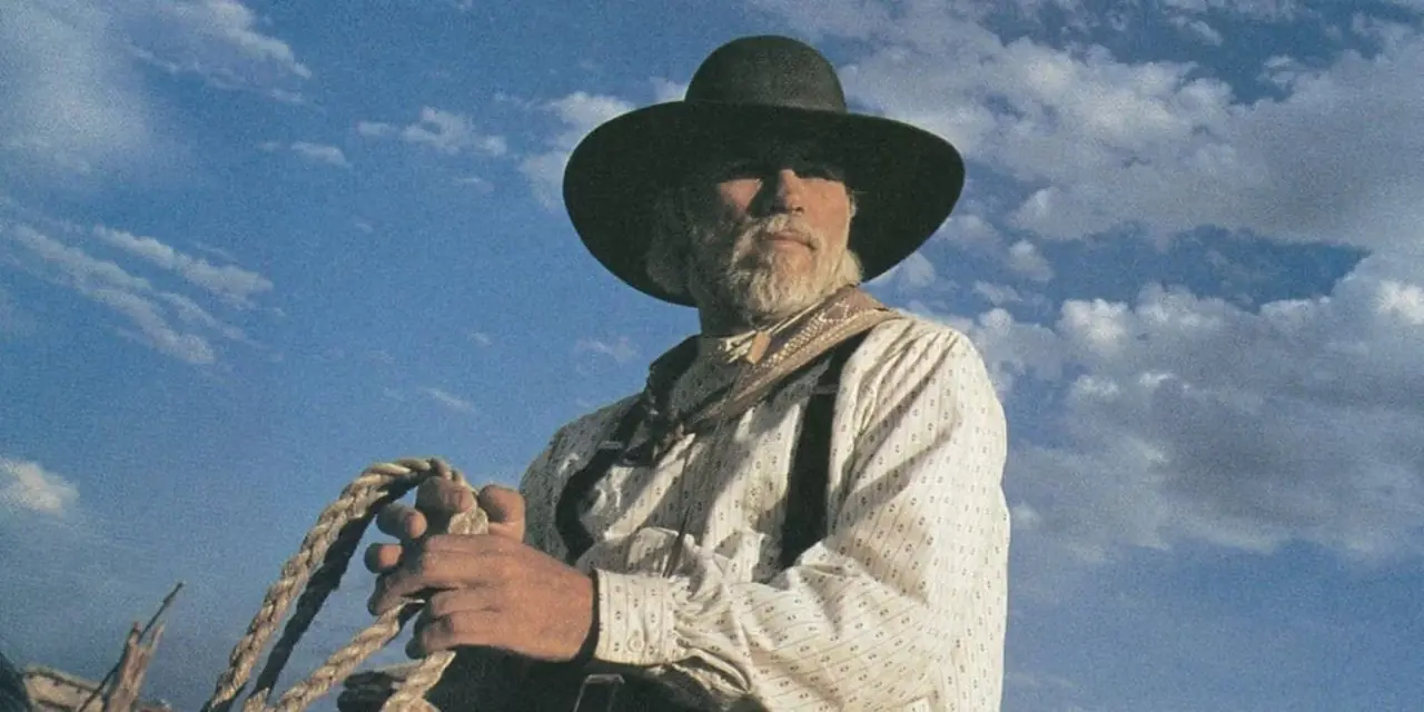 وودرو يرتدي قبعة ويمسك بحبل في Lonesome Dove وودرو يرتدي قبعة ويمسك بحبل في Lonesome Dove