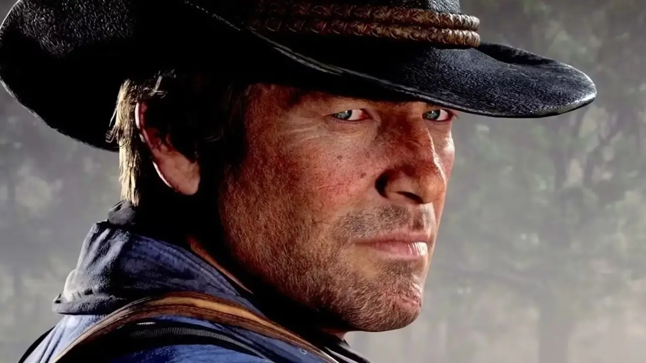 آرثر مورغان من لعبة Red Dead Redemption 2 ينظر نحو الكاميرا آرثر مورغان من لعبة Red Dead Redemption 2 ينظر نحو الكاميرا