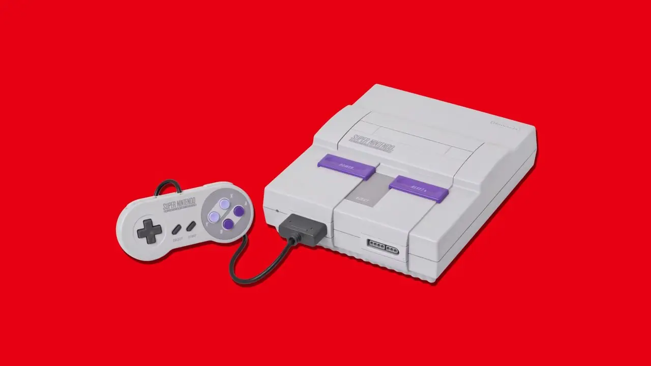 SNES ووحدة التحكم المرفقة على خلفية حمراء. SNES ووحدة التحكم المرفقة على خلفية حمراء.
