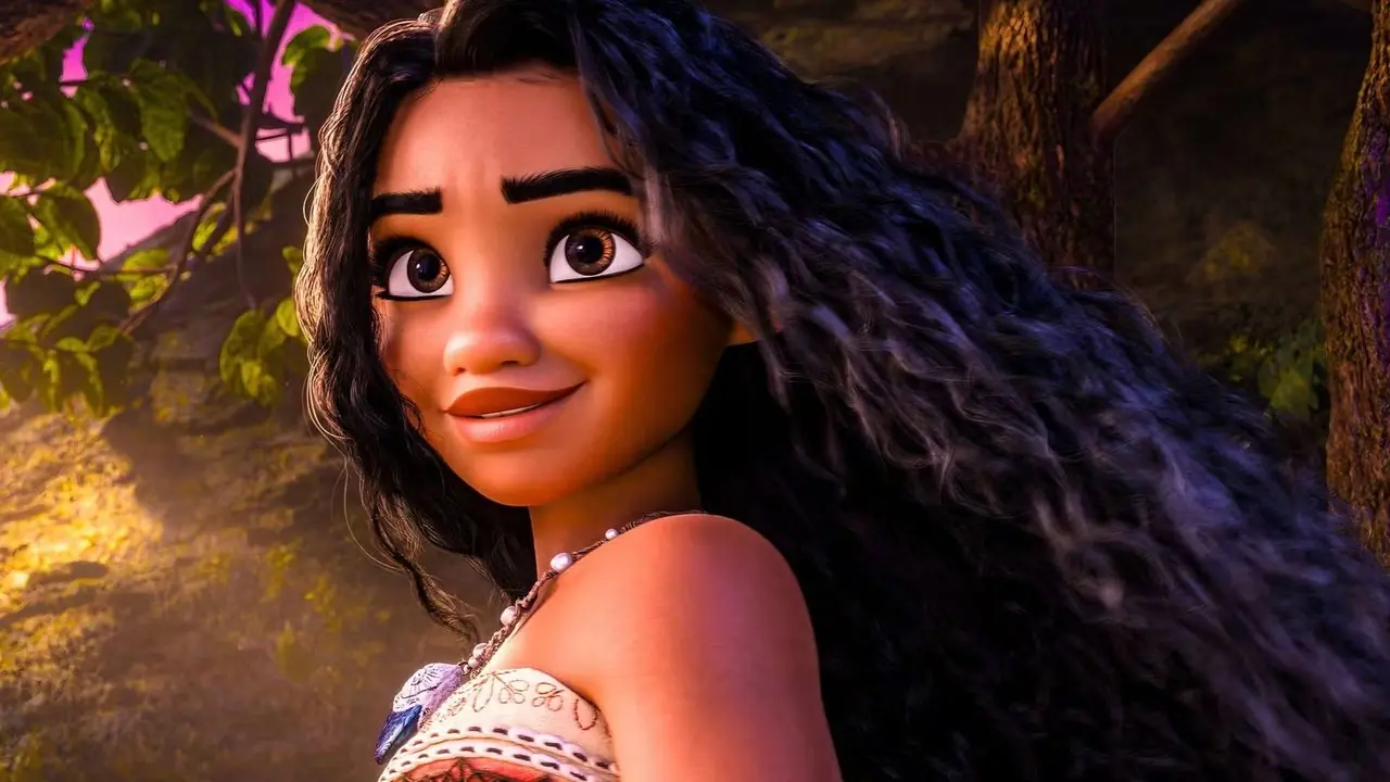 Moana mirando al horizonte con un árbol detrás de ella en Moana 2 Moana mirando al horizonte con un árbol detrás de ella en Moana 2
