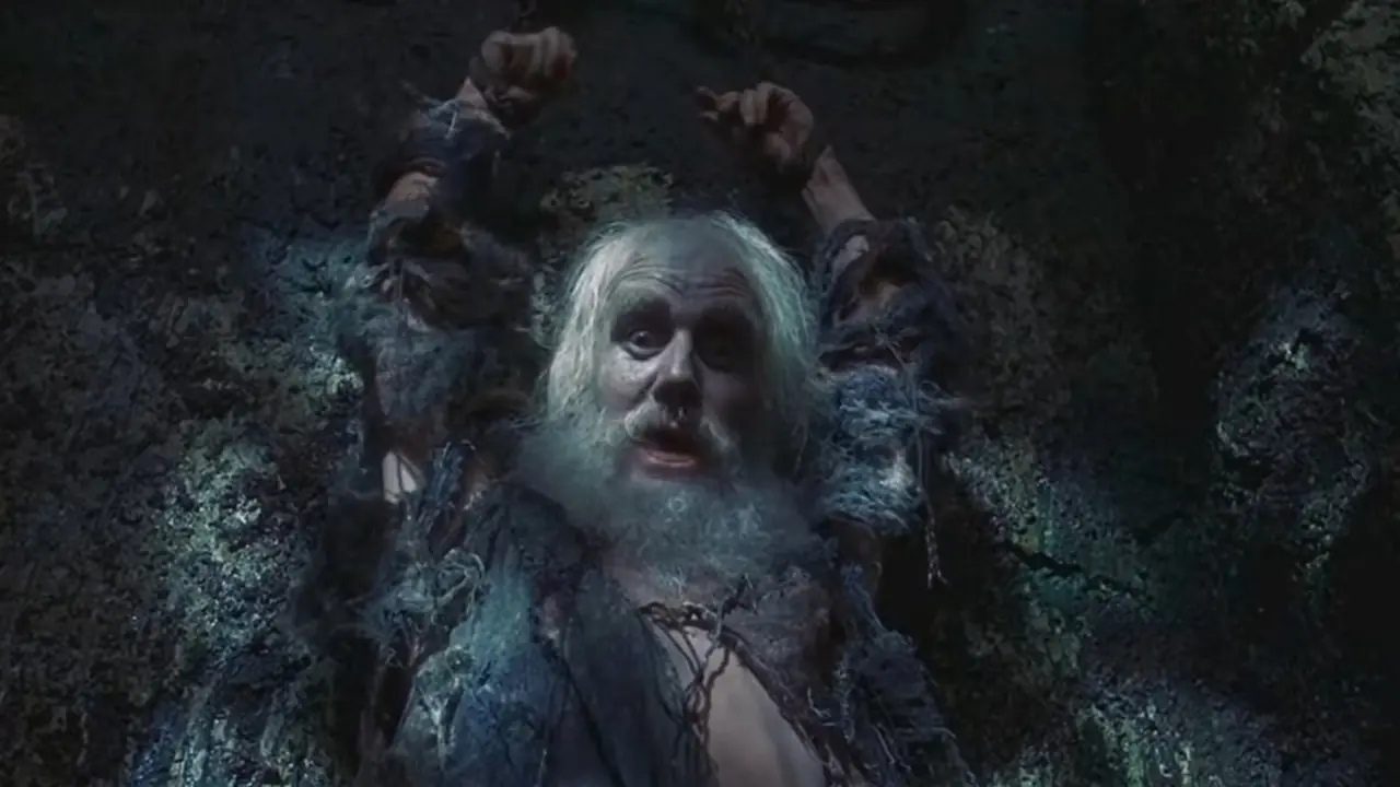 Monty Python's The Life of Brian gevangenisscène met de gevangene vastgeketend aan zijn polsen