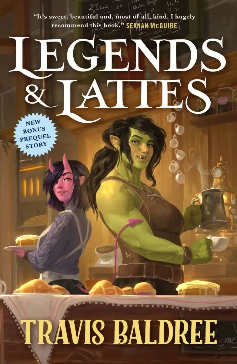 La portada estadounidense de Legends & Lattes de Travis Baldree, que presenta a un orco de piel verde y una súcubo de piel rosada preparando café. La portada estadounidense de Legends & Lattes de Travis Baldree, que presenta a un orco de piel verde y una súcubo de piel rosada preparando café.
