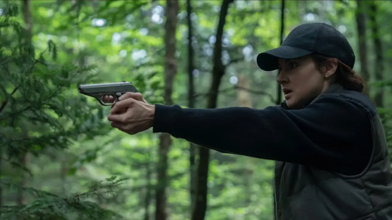 ユナボマーで銃を構える人物