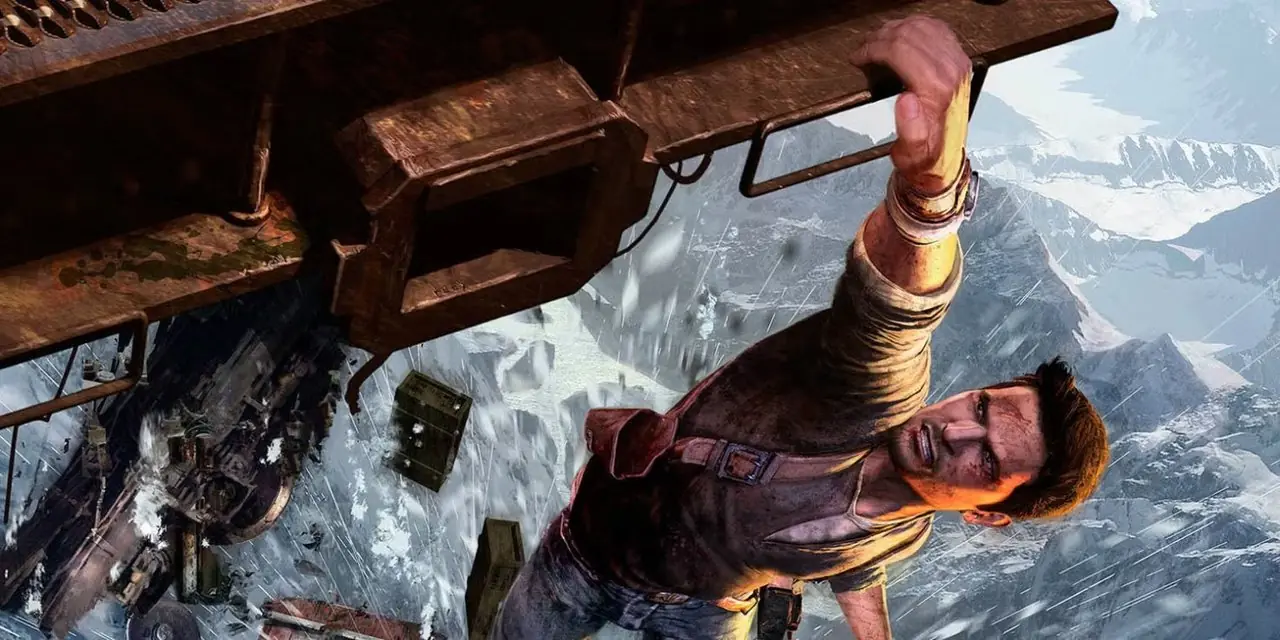 Nathan Drake klimt in een ontspoorde trein in Uncharted 2