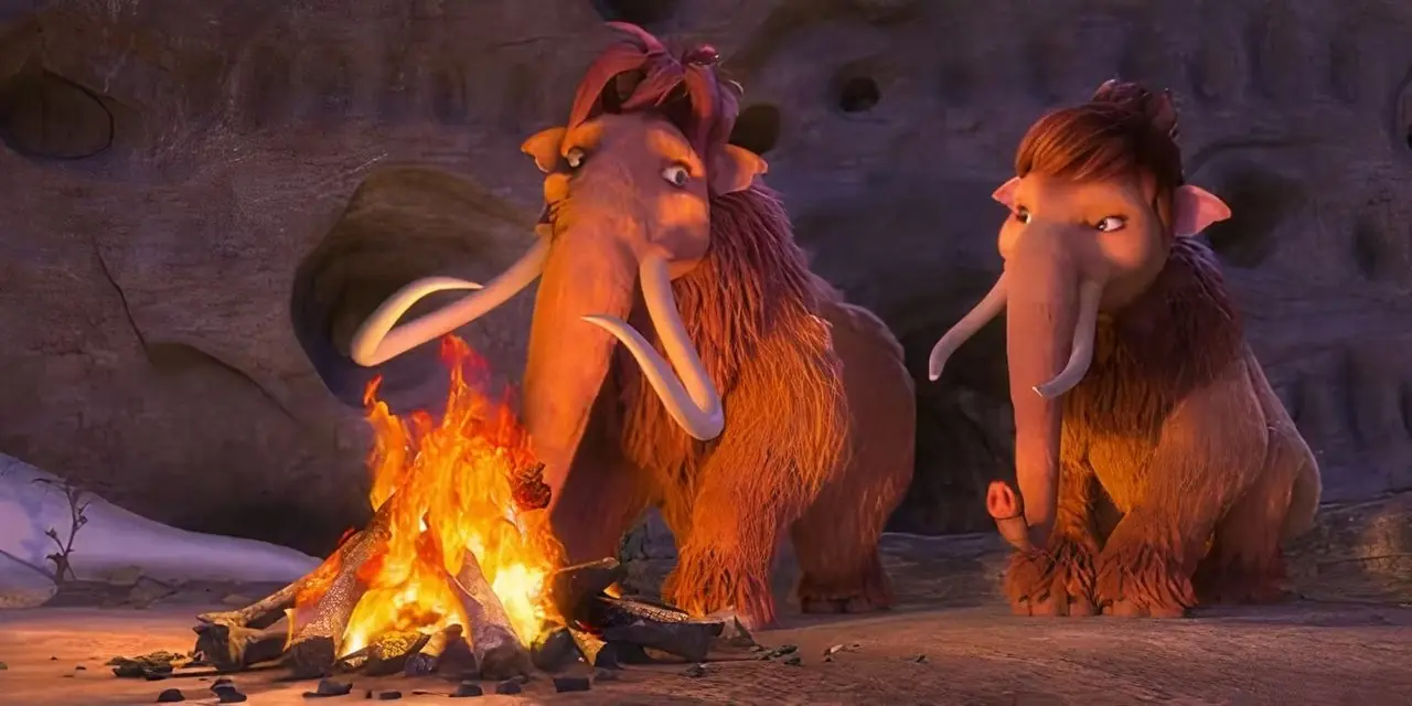 Ellie y Peaches sentadas juntas alrededor de una fogata en Ice Age: Collision Course.