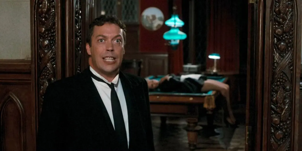 Tim Curry como el mayordomo en Clue the Movie