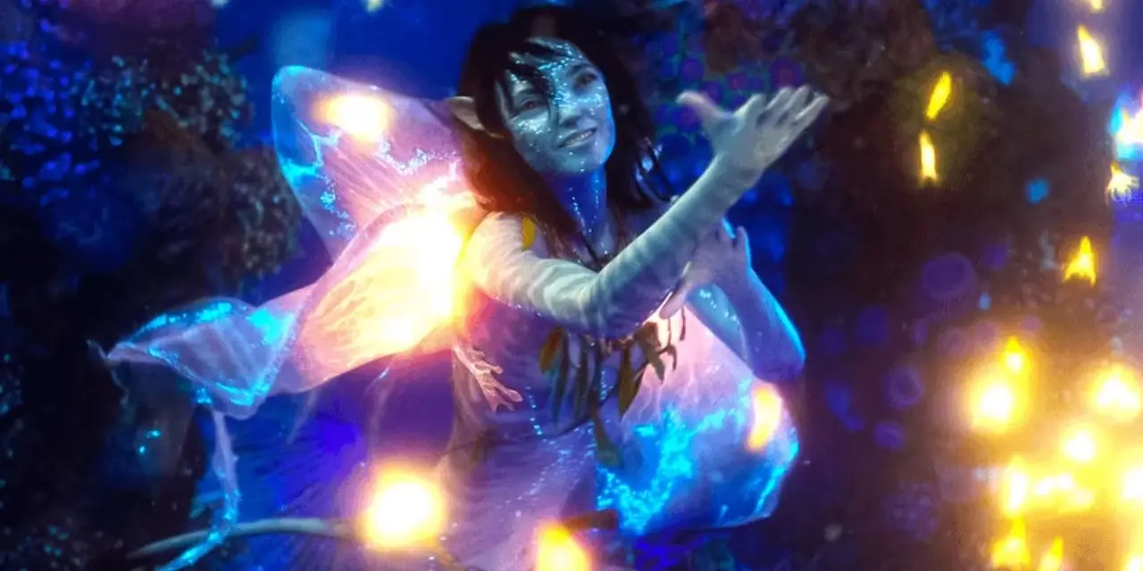 Kiri controlando peixes bioluminescentes em Avatar: The Way of Water Kiri controlando peixes bioluminescentes em Avatar: The Way of Water