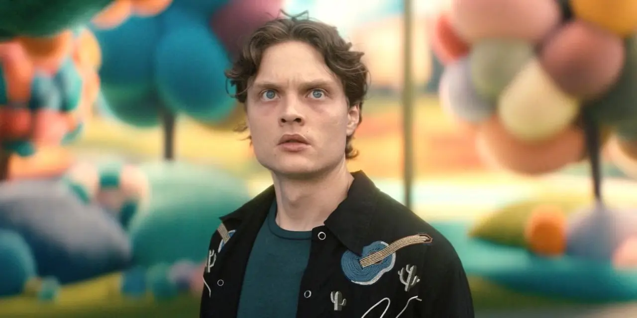 Sam (Asa Germann) sembra sorpreso mentre si trova in una città colorata nella seconda stagione della quinta generazione Sam (Asa Germann) sembra sorpreso mentre si trova in una città colorata nella seconda stagione della quinta generazione
