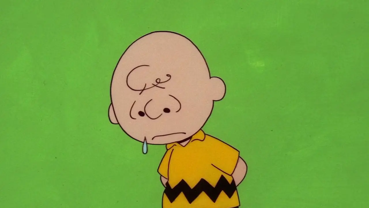 Charlie Brown pleure dans des cacahuètes