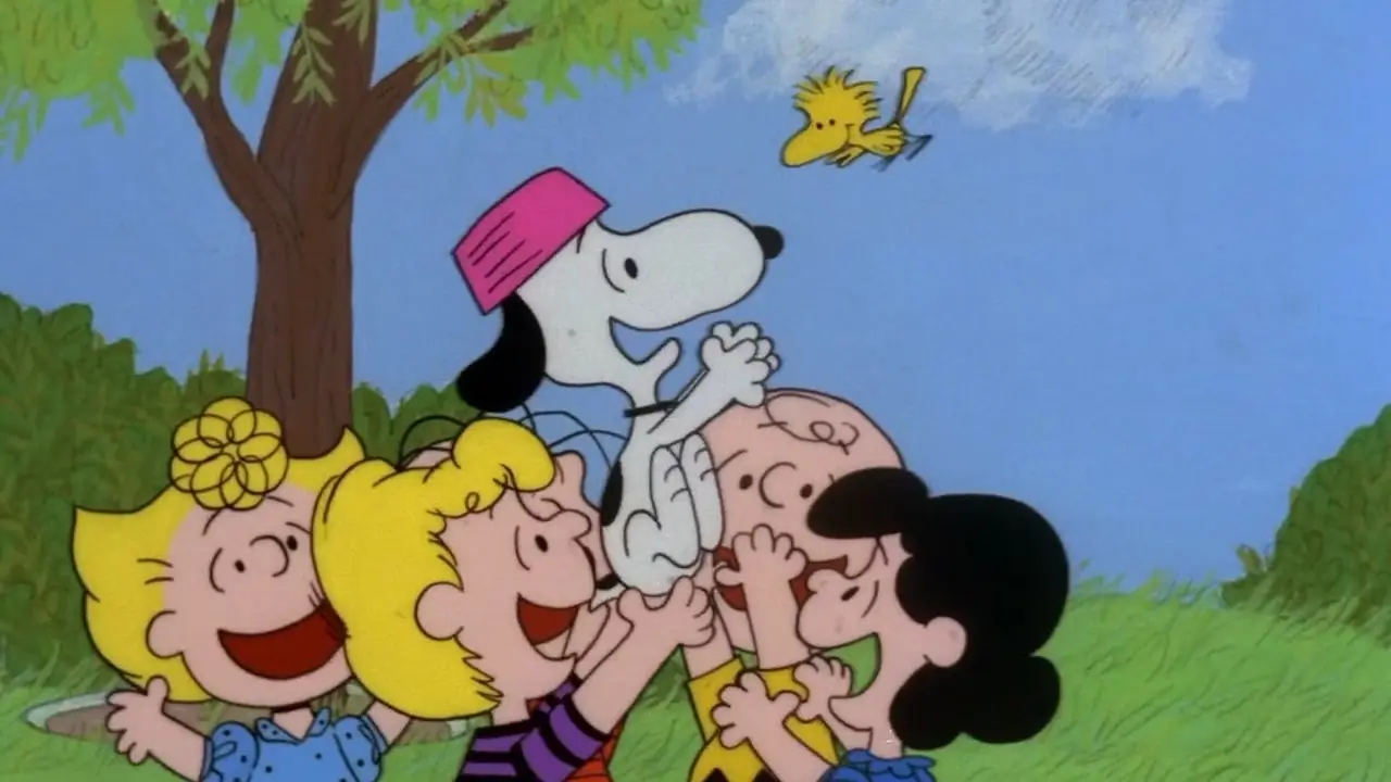 Charlie Brown en de bende die Snoopy draagt